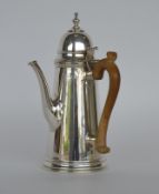 A good quality heavy coffee pot with tapered sides