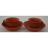 An attractive pair of earthenware cabinet cups and