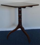 A Georgian mahogany tilt top table on three splaye