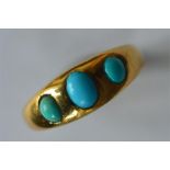 An 18 carat turquoise gypsy set ring. Approx. 3 gr