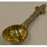 An unusual Continental caddy spoon with gilt bowl,