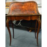 A French writing bureau with brass mounts and sati