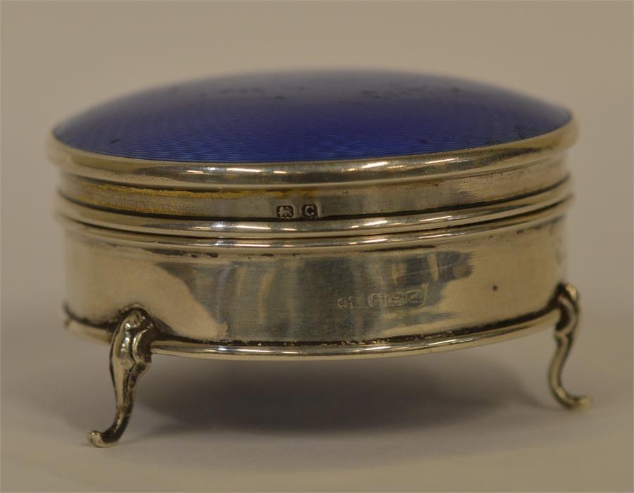 A good quality blue enamalled hinged top ring box.