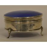 A good quality blue enamalled hinged top ring box.