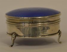 A good quality blue enamalled hinged top ring box.