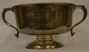 A good heavy trophy cup on pedestal base. Approx.
