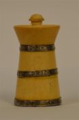 A good turned ivory pepper mill with turned thumb