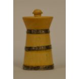 A good turned ivory pepper mill with turned thumb