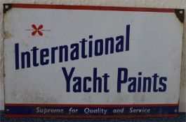 An "International Yacht Paints" sign. Approx. 28 c
