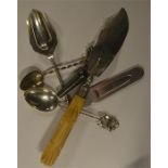 A quantity of silver spoons, butter knife, whistle