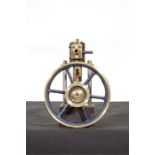 A small vertical live steam stationary engine with