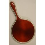 A good red enamelled hand mirror. London 1925. By