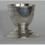 An attractive etched glass vase on Continental sil