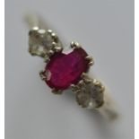 A 9 carat ruby red stone ring. Approx. 2 grams. Es