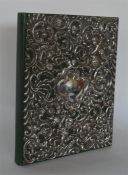A good Victorian silver embossed stationery folder