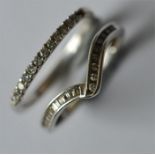 A small diamond half eternity ring together with a
