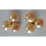 A pair of pearl and diamond cluster earrings in cl