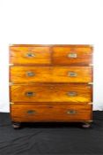 A good mahogany military chest with brass inset ha