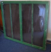 A glazed wall mounted display case with side hinge