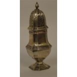 A large heavy caster with reeded sides, cut corner