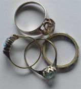 Two 9 carat dress rings together with one other. E