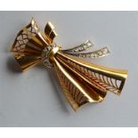 An attractive French rose gold brooch in the form