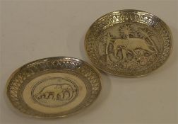 Two circular Indian bowls decorated with elephants
