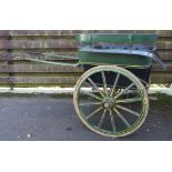 A good governess cart in green with spoked wheels