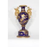 A large impressive Continental blue and gilt urn o