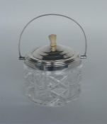 Good cut glass biscuit barrel with silver lid and