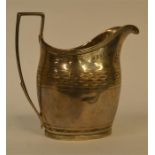 A good Georgian silver bright cut cream jug with r