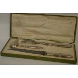 A good French three piece carving set marked to ha