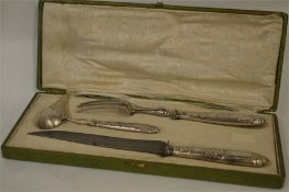 A good French three piece carving set marked to ha