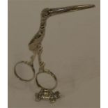 A pair of unusual decorative scissors in the form