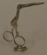 A pair of unusual decorative scissors in the form