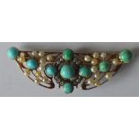 An attractive 15 carat pearl diamond and turquoise