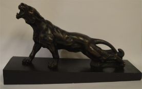 A good bronze of a snarling tiger on marble base.