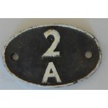 A British Railways cast iron shed code plate."2A",