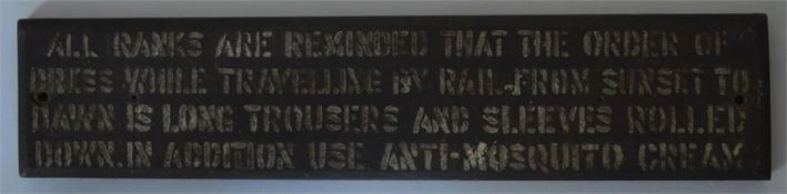 A wooden plaque, "All ranks are reminded that the