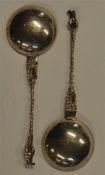 A pair of twisted stem apostle top spoons with gil