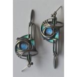An attractive pair of stylish silver and enamelled