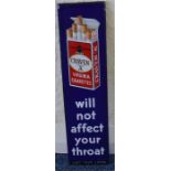 A "Craven A will not affect your throat" plaque. A