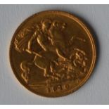 A 1910 half sovereign. Est. £80 - £100.