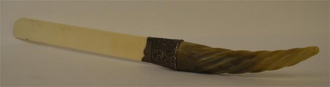 A good carved ivory paper knife with embossed hand