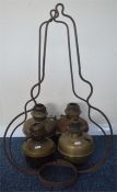 Four assorted brass oil lamps together with two pe