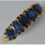 A good quality sapphire five stone ring in claw mo