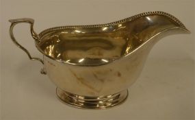 A good silver Adams' style sauce boat on pedestal