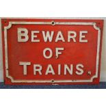 A cast iron sign, "Beware of Trains". Approx. 38.5