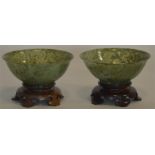 A pair of good quality agate tapering bowls on har