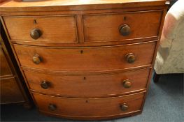 An Antique bow front small chest of drawers. Est.